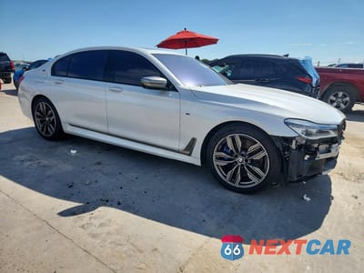 Czwarte zdjęcie samochodu z boku: 2019 BMW M760 XI VIN:WBA7H6C58KG615050 - miniatura