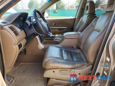 Zdjęcie 7 z 12 samochodu: 2005 HONDA PILOT EXL VIN:2HKYF18705H529046 - miniatura