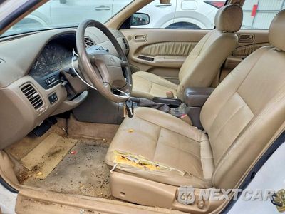 Zdjęcie 7 z 13 samochodu: 1997 NISSAN MAXIMA GXE VIN:JN1CA21D0VT811054 - miniatura