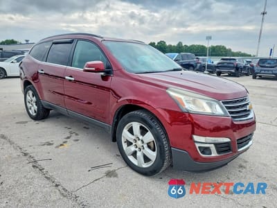 Czwarte zdjęcie samochodu z boku: 2016 CHEVROLET TRAVERSE LT VIN:1GNKRGKD9GJ277104 - miniatura