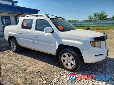 Czwarte zdjęcie samochodu z boku: 2007 HONDA RIDGELINE RTL VIN:2HJYK165X7H522335 - miniatura