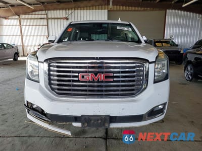 Piąte zdjęcie samochodu w środku: 2019 GMC YUKON SLT VIN:1GKS2BKC8KR183768 - miniatura