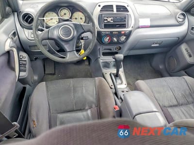 Zdjęcie 8 z 12 samochodu: 2002 TOYOTA RAV4 BASE VIN:JTEGH20V320060402 - miniatura