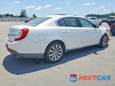 Trzecie zdjęcie samochodu z tyłu: 2015 LINCOLN MKS VIN:1LNHL9DK3FG603448 - miniatura