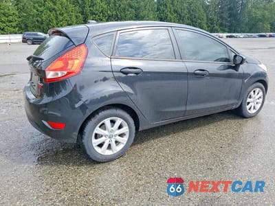 Trzecie zdjęcie samochodu z tyłu: 2011 FORD FIESTA SE VIN:3FADP4EJ2BM186006 - miniatura