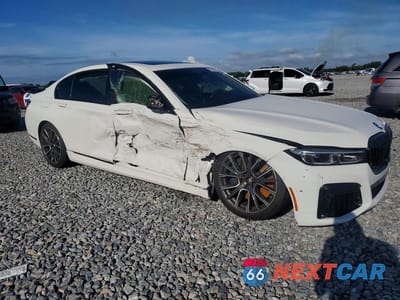 Czwarte zdjęcie samochodu z boku: 2021 BMW 750 XI VIN:WBA7U2C00MCF14655 - miniatura
