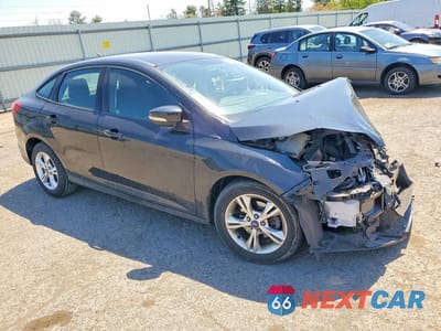 Czwarte zdjęcie samochodu z boku: 2013 FORD FOCUS SE VIN:1FADP3F25DL274716 - miniatura