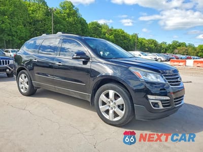 Czwarte zdjęcie samochodu z boku: 2016 CHEVROLET TRAVERSE LTZ VIN:1GNKVJKDXGJ173505 - miniatura