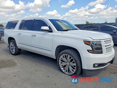 Czwarte zdjęcie samochodu z boku: 2017 CHEVROLET SUBURBAN K1500 LT VIN:1GNSKHKC9HR344708 - miniatura