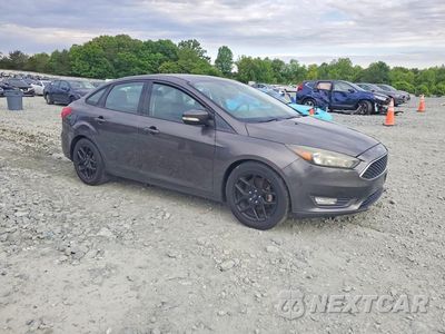 Czwarte zdjęcie samochodu z boku: 2016 FORD FOCUS SE VIN:1FADP3F29GL249452 - miniatura