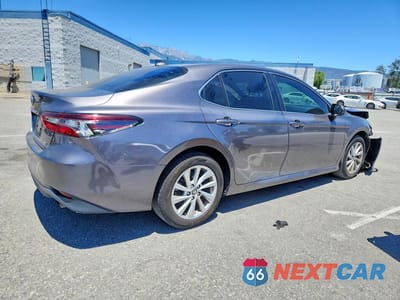 Trzecie zdjęcie samochodu z tyłu: 2023 TOYOTA CAMRY LE VIN:4T1C11AK8PU081702 - miniatura