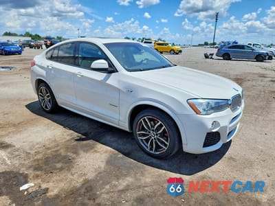 Czwarte zdjęcie samochodu z boku: 2016 BMW X4 XDRIVE28I VIN:5UXXW3C5XG0R21589 - miniatura