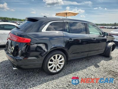Trzecie zdjęcie samochodu z tyłu: 2010 LINCOLN MKT VIN:2LMHJ5AR2ABJ20571 - miniatura