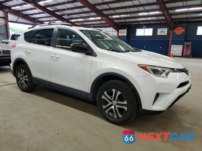 Czwarte zdjęcie samochodu z boku: 2018 TOYOTA RAV4 LE VIN:JTMBFREV6JJ258177 - miniatura