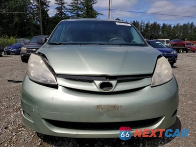 Piąte zdjęcie samochodu w środku: 2010 TOYOTA SIENNA LE 8-PASSENGER VIN:5TDKK4CC3AS321125 - miniatura