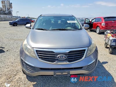 Piąte zdjęcie samochodu w środku: 2011 KIA SPORTAGE LX VIN:KNDPB3A22B7059362 - miniatura