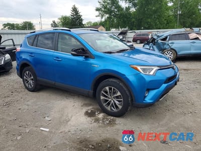 Czwarte zdjęcie samochodu z boku: 2016 TOYOTA RAV4 HV XLE VIN:JTMRJREV1GD042032 - miniatura