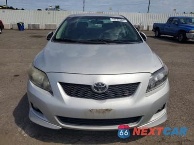 Piąte zdjęcie samochodu w środku: 2009 TOYOTA COROLLA S VIN:1NXBU40E69Z001350 - miniatura