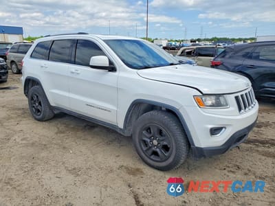 Czwarte zdjęcie samochodu z boku: 2016 JEEP GRAND CHEROKEE LAREDO VIN:1C4RJFAG6GC443989 - miniatura
