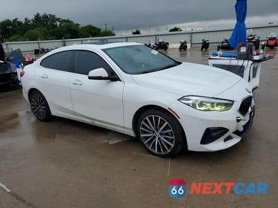 Czwarte zdjęcie samochodu z boku: 2021 BMW 228I VIN:WBA53AK04M7J18448 - miniatura