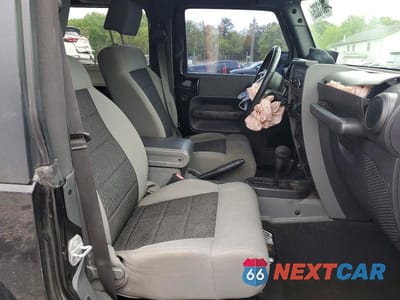 Zdjęcie 10 z 13 samochodu: 2010 JEEP WRANGLER SPORT VIN:1J4AA2D14AL102475 - miniatura