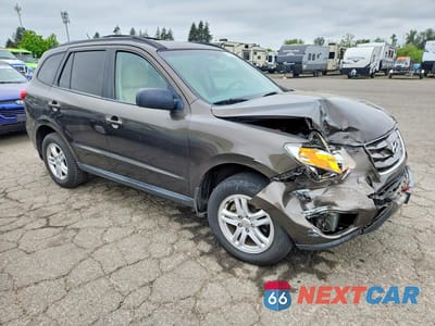 Czwarte zdjęcie samochodu z boku: 2011 HYUNDAI SANTA FE GLS VIN:5XYZGDAG0BG016606 - miniatura