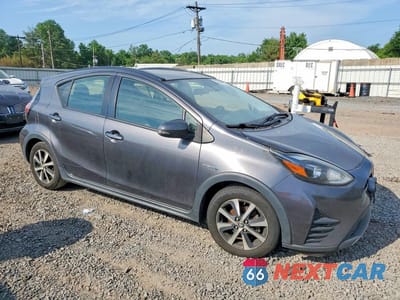 Czwarte zdjęcie samochodu z boku: 2018 TOYOTA PRIUS C VIN:JTDKDTB39J1608701 - miniatura