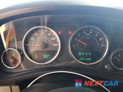 Zdjęcie 9 z 13 samochodu: 2011 JEEP WRANGLER UNLIMITED SAHARA VIN:1J4BA5H15BL592815 - miniatura