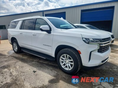 Czwarte zdjęcie samochodu z boku: 2024 CHEVROLET SUBURBAN C1500 LT VIN:1GNSCCKD3RR235090 - miniatura