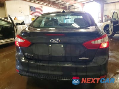 Zdjęcie 6 z 12 samochodu: 2014 FORD FOCUS SE VIN:1FADP3F20EL108055 - miniatura