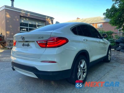 Czwarte zdjęcie samochodu z boku: 2016 BMW X4 XDRIVE28I VIN:5UXXW3C52G0R20288 - miniatura