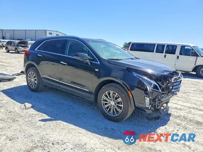 Czwarte zdjęcie samochodu z boku: 2019 CADILLAC XT5 LUXURY VIN:1GYKNCRS8KZ275995 - miniatura