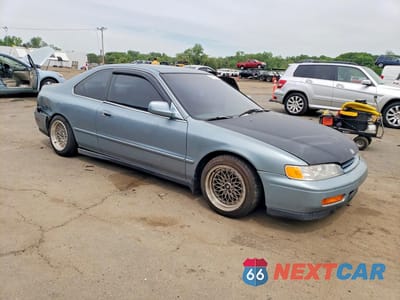 Czwarte zdjęcie samochodu z boku: 1994 HONDA ACCORD EX VIN:1HGCD7267RA050091 - miniatura