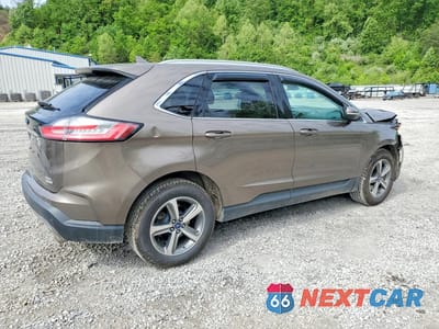 Trzecie zdjęcie samochodu z tyłu: 2019 FORD EDGE SEL VIN:2FMPK4J94KBC59603 - miniatura