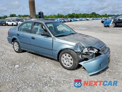 Czwarte zdjęcie samochodu z boku: 1999 HONDA CIVIC LX VIN:1HGEJ6678XL020579 - miniatura