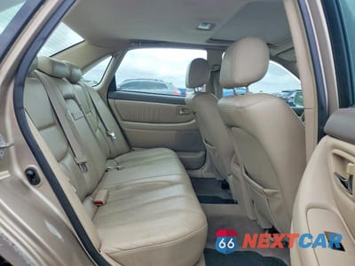 Zdjęcie 10 z 13 samochodu: 2003 TOYOTA AVALON XL VIN:4T1BF28B93U331225 - miniatura