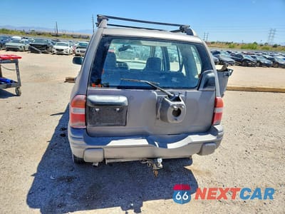 Zdjęcie 6 z 12 samochodu: 2000 CHEVROLET TRACKER VIN:2CNBE13C1Y6912768 - miniatura