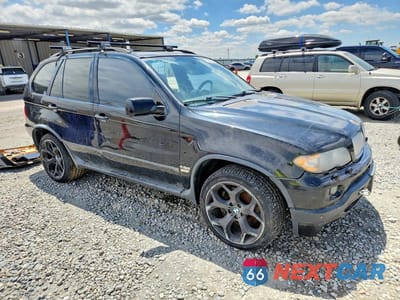 Czwarte zdjęcie samochodu z boku: 2004 BMW X5 4.8IS VIN:5UXFA93574LE81986 - miniatura