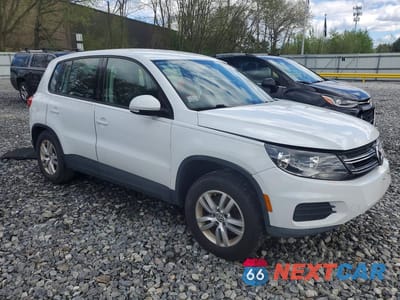Czwarte zdjęcie samochodu z boku: 2014 VOLKSWAGEN TIGUAN S VIN:WVGBV3AX1EW564957 - miniatura