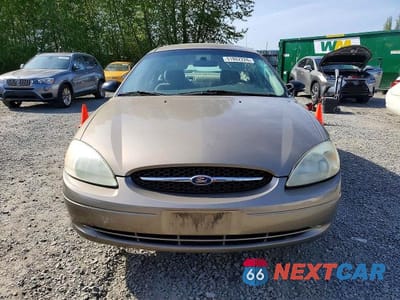 Piąte zdjęcie samochodu w środku: 2002 FORD TAURUS LX VIN:1FAFP52202G210602 - miniatura