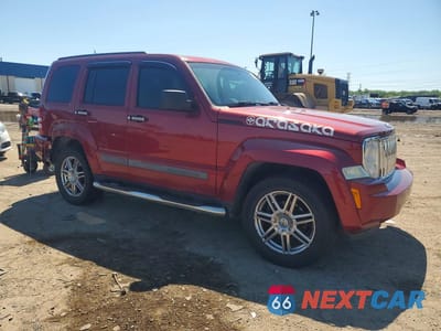 Czwarte zdjęcie samochodu z boku: 2012 JEEP LIBERTY SPORT VIN:1C4PJMAK0CW149819 - miniatura