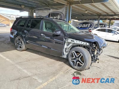 Czwarte zdjęcie samochodu z boku: 2018 MERCEDES-BENZ GLS 550 4MATIC VIN:4JGDF7DEXJB143439 - miniatura