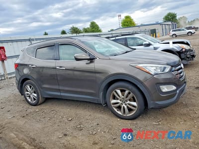 Czwarte zdjęcie samochodu z boku: 2014 HYUNDAI SANTA FE SPORT 2.0T VIN:5XYZWDLA4EG221751 - miniatura
