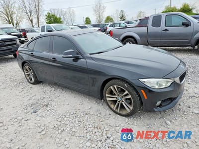 Czwarte zdjęcie samochodu z boku: 2015 BMW 428 XI GRAN COUPE VIN:WBA4A7C52FD414359 - miniatura