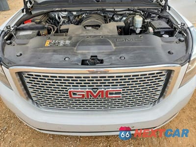 Zdjęcie 12 z 13 samochodu: 2017 GMC YUKON DENALI VIN:1GKS1CKJ1HR188665 - miniatura