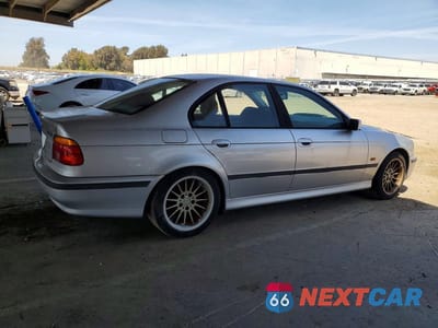 Trzecie zdjęcie samochodu z tyłu: 1999 BMW 540 I VIN:WBADN5336XGC91661 - miniatura