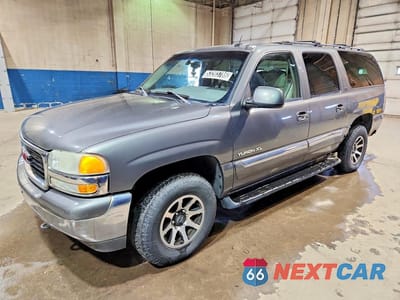 2002 GMC YUKON XL K1500 3GKFK16Z32G320612 - główne zdjęcie licytacji z USA - miniatura