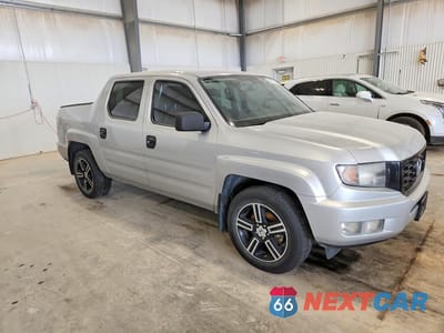Czwarte zdjęcie samochodu z boku: 2014 HONDA RIDGELINE SPORT VIN:5FPYK1F73EB013722 - miniatura