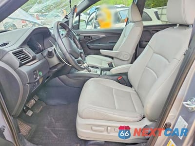Zdjęcie 7 z 12 samochodu: 2022 HONDA PASSPORT EXL VIN:5FNYF8H54NB031566 - miniatura