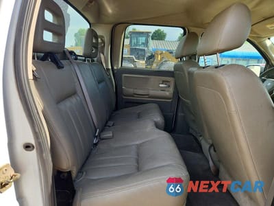 Zdjęcie 10 z 12 samochodu: 2005 DODGE DAKOTA QUAD LARAMIE VIN:1D7HE58N75S138556 - miniatura
